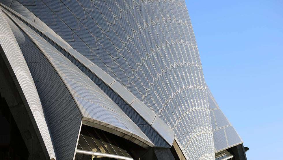 How Snow and Ice tiles reflect the changing light brings the building to life. This is one of its most striking design features.